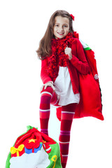 Little girl holding the santa claus bag