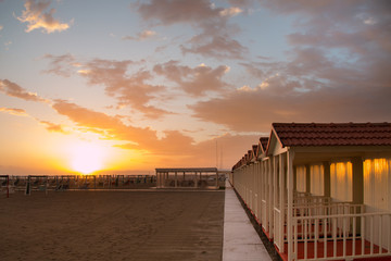 Forte dei Marmi's beach cabin at sunset