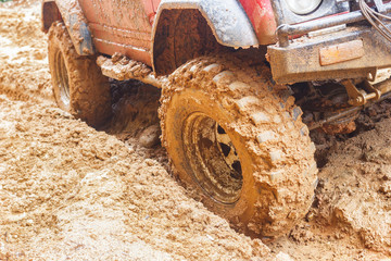 car tires in dirt road