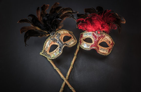 amazing beautiful closeup view of theatrical colorful masks on dark grey background