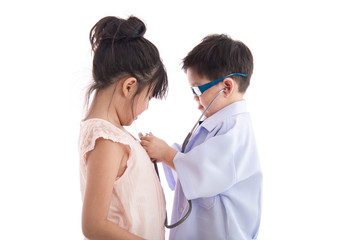 Asian children playing as doctor and patient