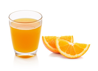 Fresh orange and glass with juice