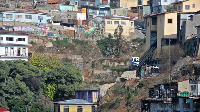 Elevators used for public transportation going up and down a hill in the historic city of Valparaiso, Chile