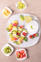 fruits on sticks and dip