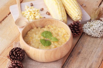 Corn soup of condensed in a wooden bowl