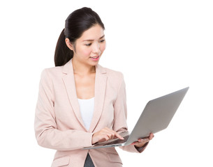 Young Businesswoman use of notebook computer