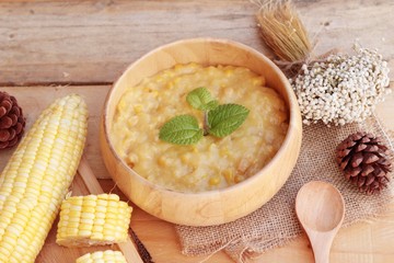 Corn soup of condensed in a wooden bowl