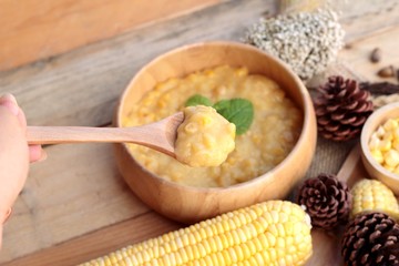 Corn soup of condensed in a wooden bowl