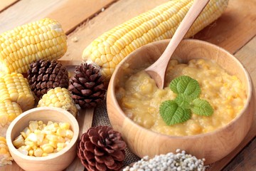 Corn soup of condensed in a wooden bowl