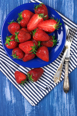 Strawberries in blue plate