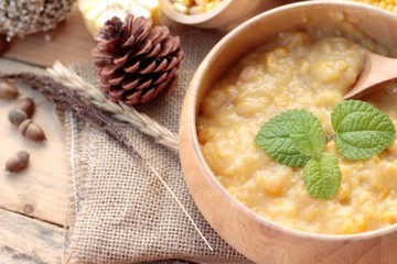 Corn soup of condensed in a wooden bowl