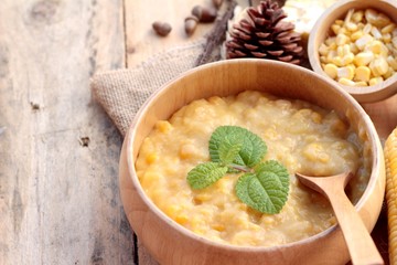 Corn soup of condensed in a wooden bowl