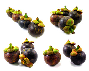 mangosteen fruit and cross section showing the thick purple skin and white