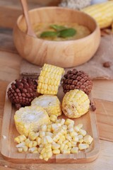 Corn soup of condensed in a wooden bowl