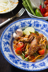 spicy papaya salad with salted crab and fermented fish