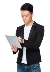 Young businessman use of notebook computer