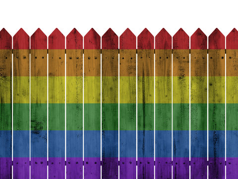 Gay flag rainbow on wooden fence texture