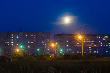 Fototapeta na wymiar Night urban landscape with residential buildings
