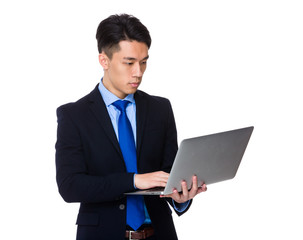 Asian businessman use of laptop computer