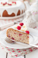 Banana Cake with Sugar Glaze Topped with Raspberries and Banana