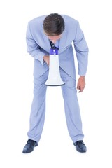  Businessman talking through megaphone