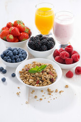 delicious and healthy breakfast on white wooden background