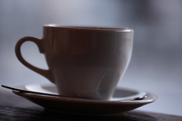 cup in a cafe near the window