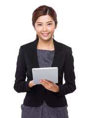 Businesswoman use of the digital tablet