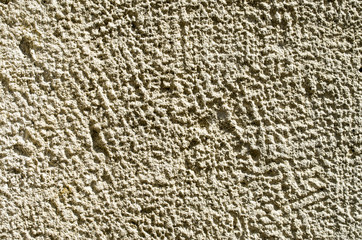 Processed stone closeup on wall