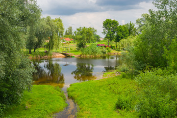 Fototapeta na wymiar Summer landscape with small river Kolomak, Poltavsk oblast, central Ukraine