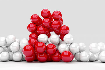 Lots of white and red balls interact. 3D render image. © marinv