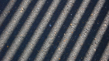 play of light and chadow on a pavement
