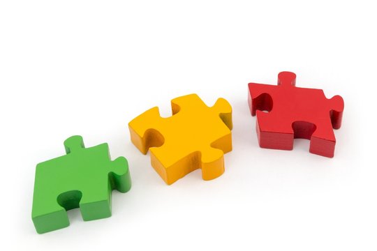colorful puzzletiles 3d - wooden surface