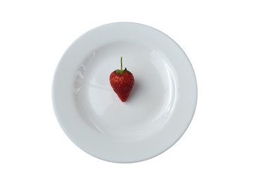  White plate with a strawberry
