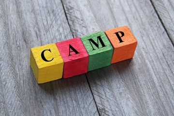 word camp on colorful wooden cubes