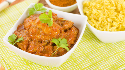 Quwarmah Al Dajaj - Kuwaiti curried chicken with saffron rice. Traditional Arab food.