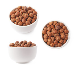 Cup filled with the hazelnuts isolated