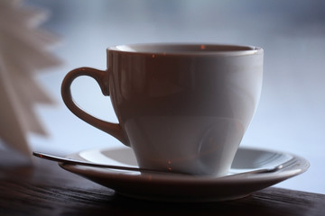 cup in a cafe near the window