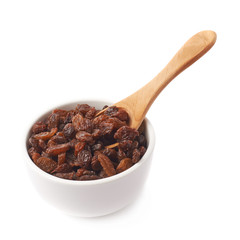 Cup filled with raisins isolated