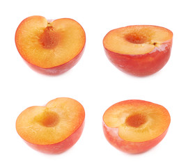 Cut open plum half isolated