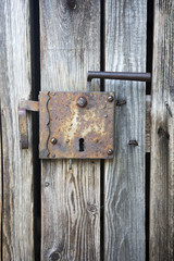 old wooden entrance door with antique door handle