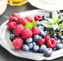 Fresh Organic Raspberries,Blueberries and Currants with Mint Lea