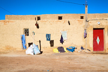 bags  roof  moroccan old wall - Powered by Adobe