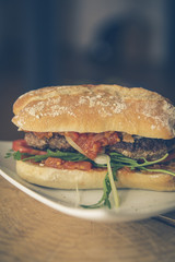 tomato sugo burger with rocket cheese