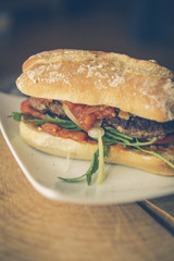 tomato sugo burger with rocket cheese