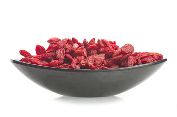 Bowl with Group of Goji berry on the white