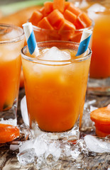 Orange icy cocktail, selective focus