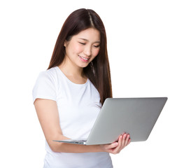 Young woman use of the notebook computer