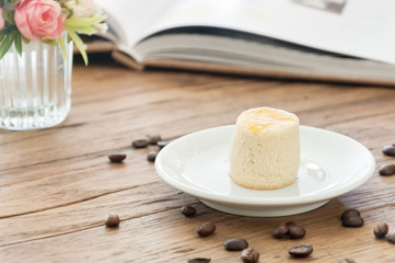 Butter scone on white saucer