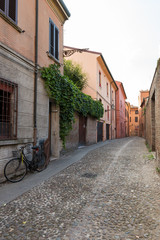 Ancient medieval street in the downtown of Ferrara city